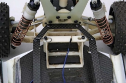 1991 Detroit Worlds RC10 - Rear Shocks Upper Plate Battery Cup