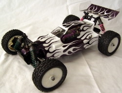 Team Losi XXX4 XXX-4 Graphite with Purple Flames - Overall Left